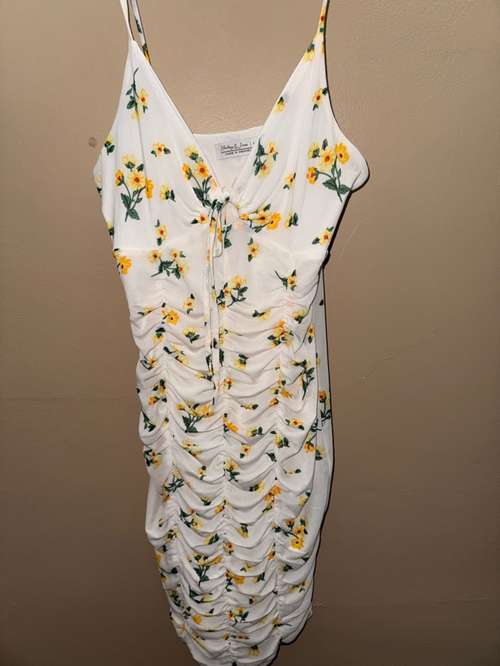 White dress with yellow floral pattern